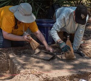 Students working at dig site