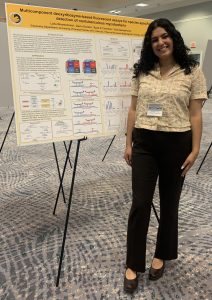 Laila posing at poster