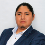 Carlos Rodrigo Professional man in a blazer and shirt against a white background.