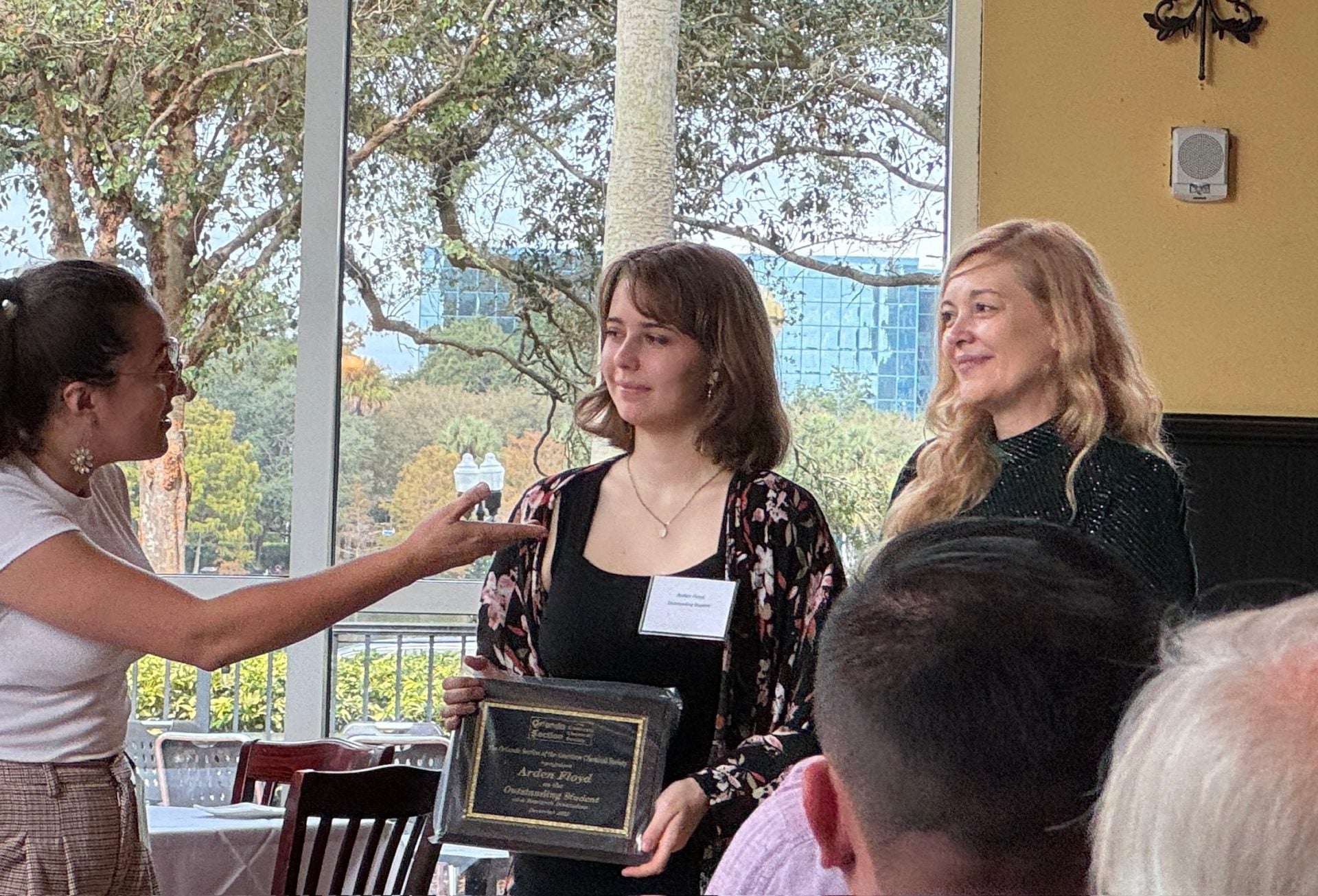 Arden Floyd receiving an award