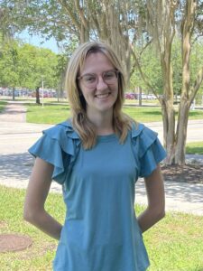 Esther Richards in a blue shirt.