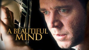 Close-up of a man looking intently at something, with the words "A Beautiful Mind" overlaid on the image.