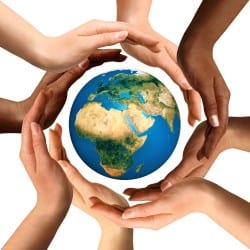 Hands around globe