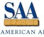 Logo of the society for american archaeology (saa) featuring stylized blue letters and a golden archaeological glyph.