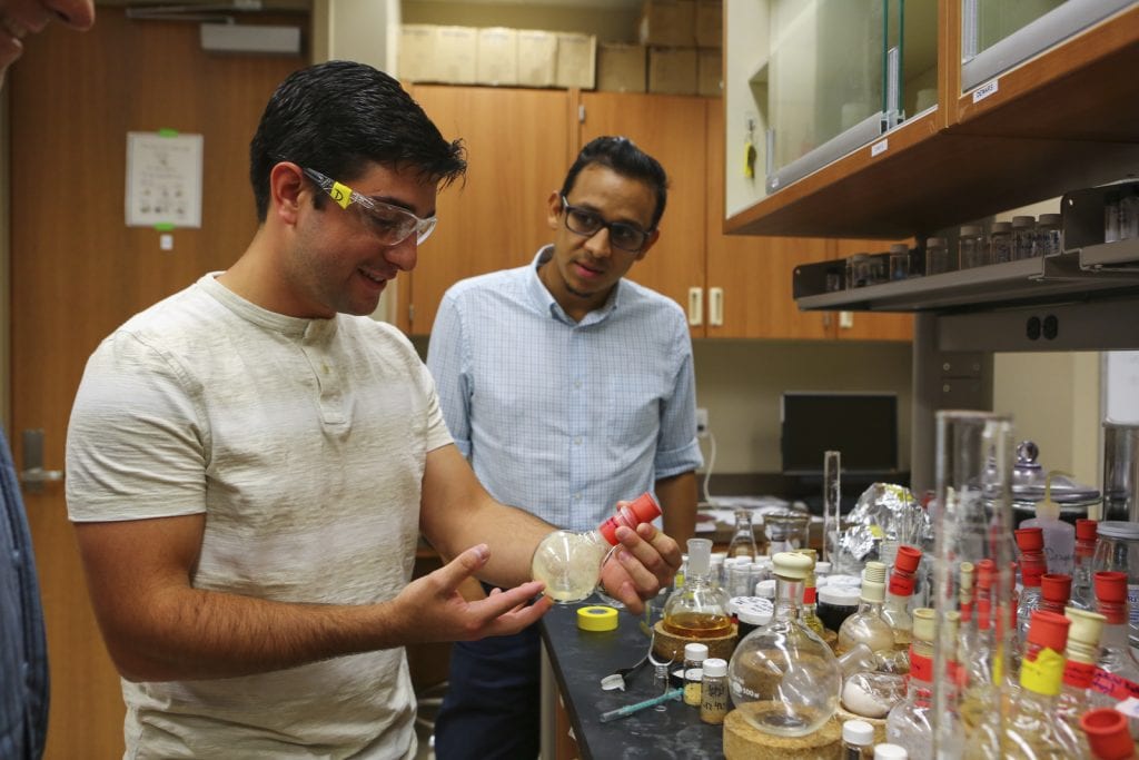 Chemistry graduate student Demetrius A. Vazquez-Molina (left) and chemistry professor Fernando Uribe-Romo (right). 