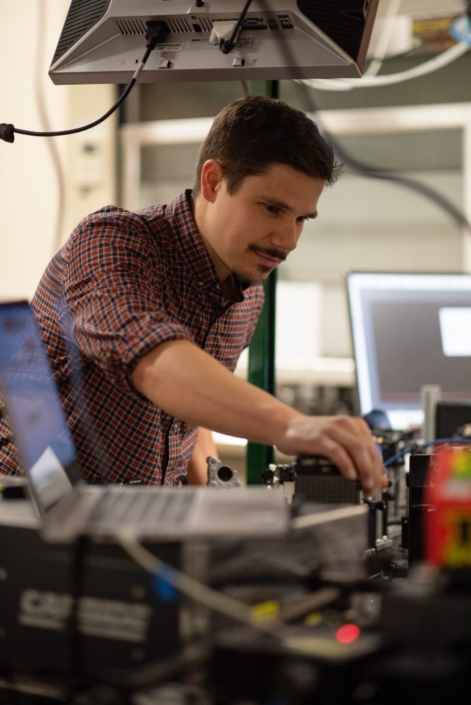 Chris Lantigua doing research in the lab 