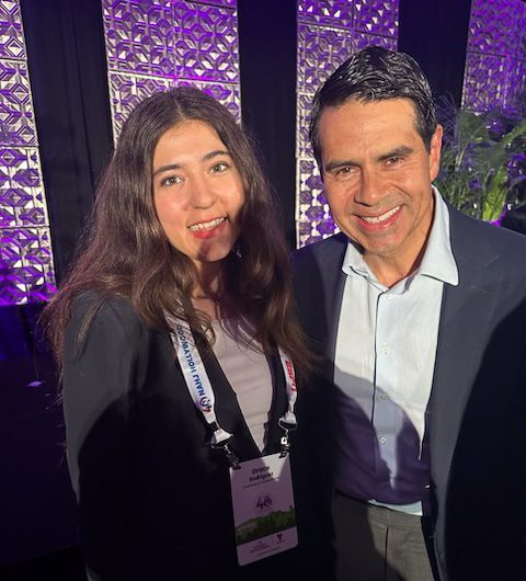 UCF NAHJ Chapter Member Grace Rodriguez poses for a photo with Cesar Conde, Chairman of the NBCUniversal News Group.