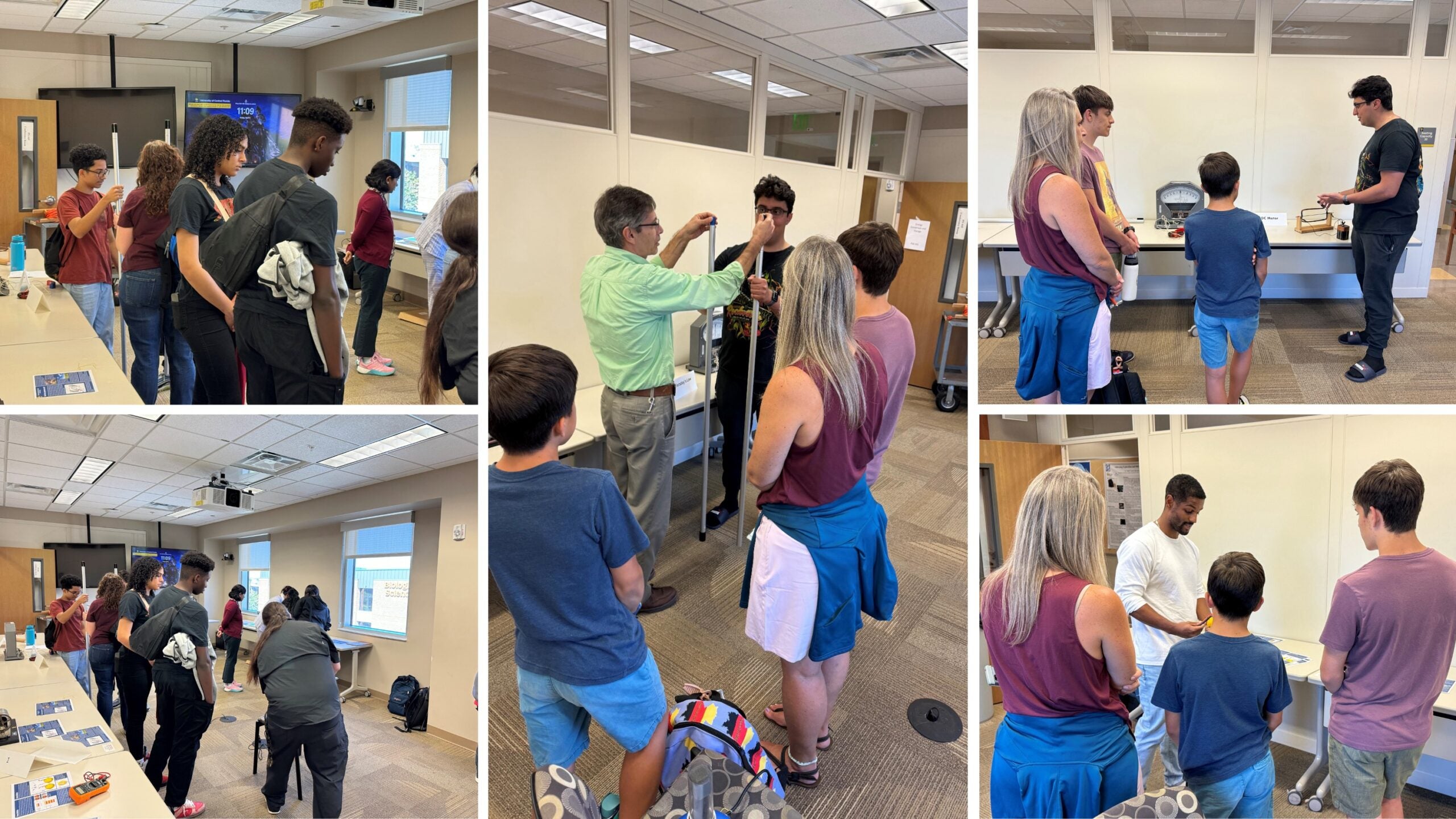 People of various ages gather in a classroom, observing science demonstrations presented by instructors at different stations.