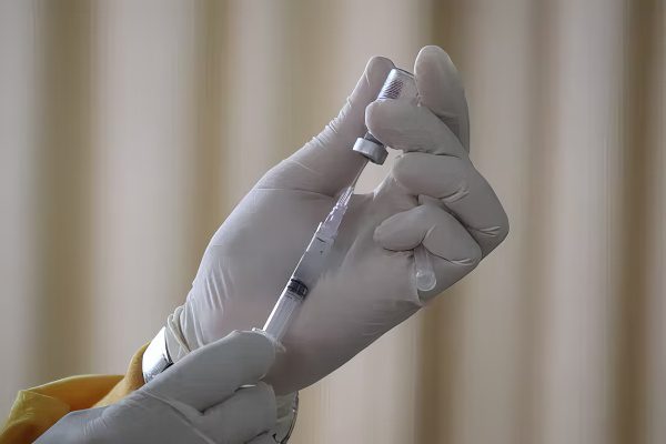 Vaccine being drawn for injection