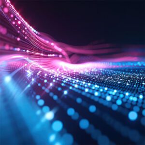 A digital abstract image showing flowing waves of blue and pink light particles against a dark background.